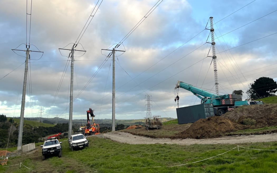 Northland's two 220kV circuits are being carried on a "Lindsey tower" (right) and three single-pole towers until a replacement pylon is built.