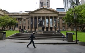 MELBOURNE, AUSTRALIA - OCTOBER 18: A view of nearly empty street during the strict restrictions due to the novel coronavirus (COVID-19) pandemic in Melbourne, Australia on October 18, 2020.