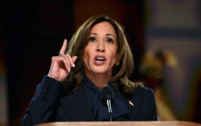 US Vice President and 2024 Democratic presidential candidate Kamala Harris speaks on the fourth and last day of the Democratic National Convention (DNC) at the United Center in Chicago, Illinois, on August 22, 2024. Vice President Kamala Harris will formally accept the party’s nomination for president today at the DNC which ran from August 19-22 in Chicago. (Photo by ANDREW CABALLERO-REYNOLDS / AFP)