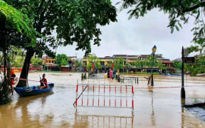 This picture taken and released by the Vietnam News Agency on October 8, 2020 shows flooding in the old city of Hoi An following following heavy rainfall in Central Vietnam.