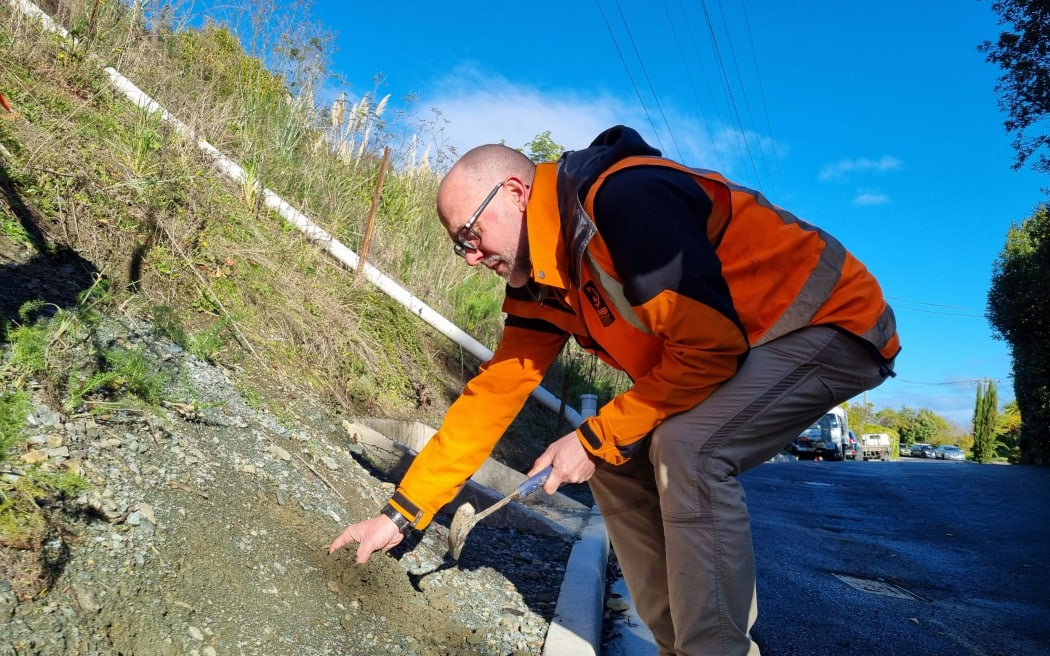 GNS Science engineering geologist Dr Chris Massey at the Tāhunanui slump, Nelson.