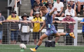 Ruben Love taking a conversion at the Game of Three Halves.