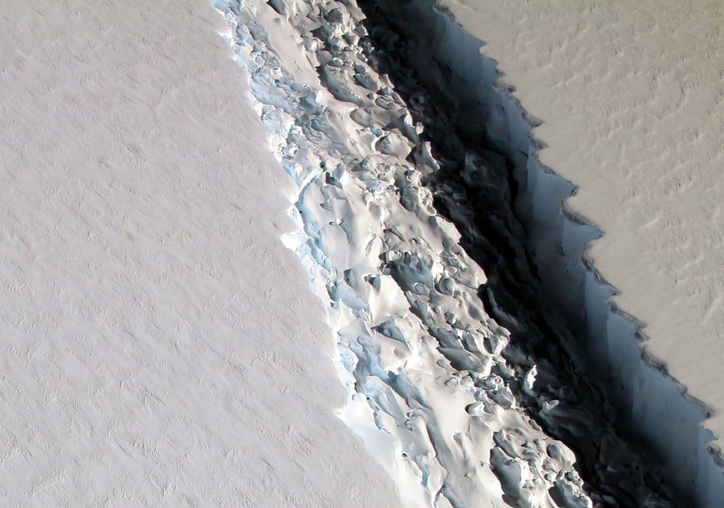 This NASA photo released December 1, 2016 shows what scientists on NASA's IceBridge mission photographed in a view of a massive rift in the Antarctic Peninsula's Larsen C ice shelf on November 10, 2016.