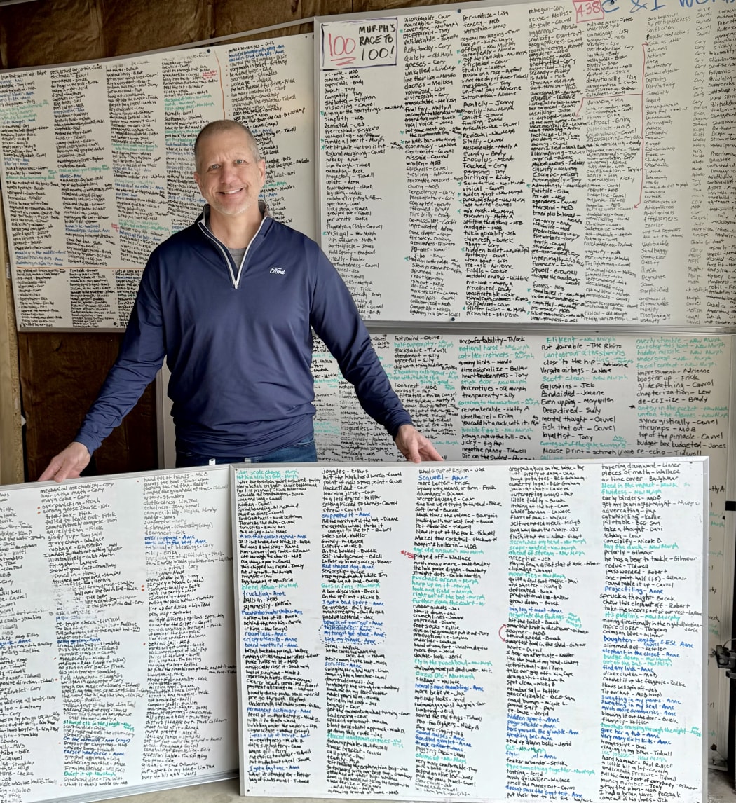 Mike O’Brien with his phrase board.