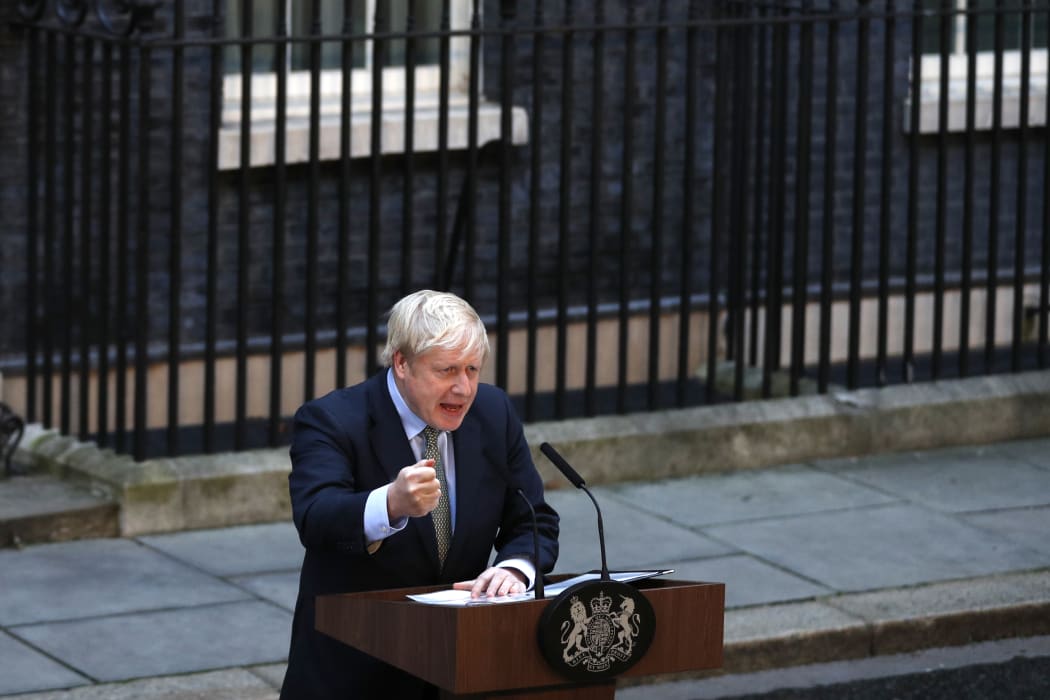 Britain's Prime Minister Boris Johnson delivers a speech outside 10 Downing Street in central London on December 13, 2019, following his Conservative party's general election victory.