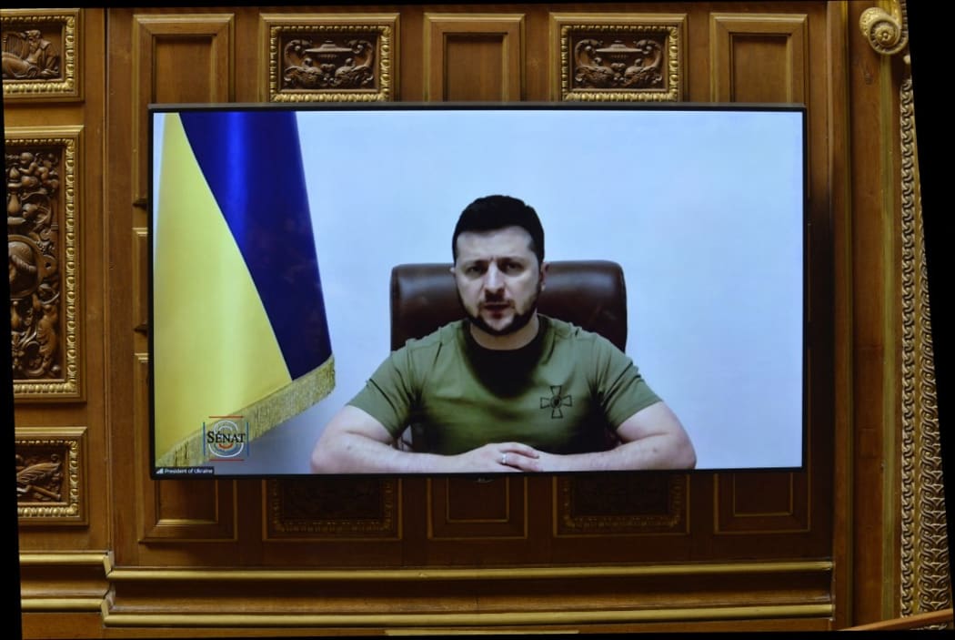 Ukrainian President Volodymyr Zelensky gives a speech to the French Parliament, 23 March 2022.