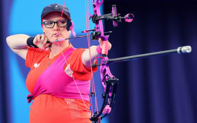 PARIS, FRANCE - AUGUST 31: Jodie Grinham of Team Great Britain competes against Phoebe Paterson Pine (not pictured) of Team Great Britain in the Para Archery Women's Individual compound Open Bronze Medal contest on day three of the Paris 2024 Summer Paralympic Games at Esplanade Des Invalides on August 31, 2024 in Paris, France. (Photo by Alex Slitz/Getty Images)