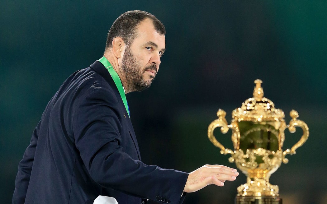 Wallabies coach Michael Cheika walks past the Webb Ellis Cup. 2015 Rugby World Cup Final against New Zealand.