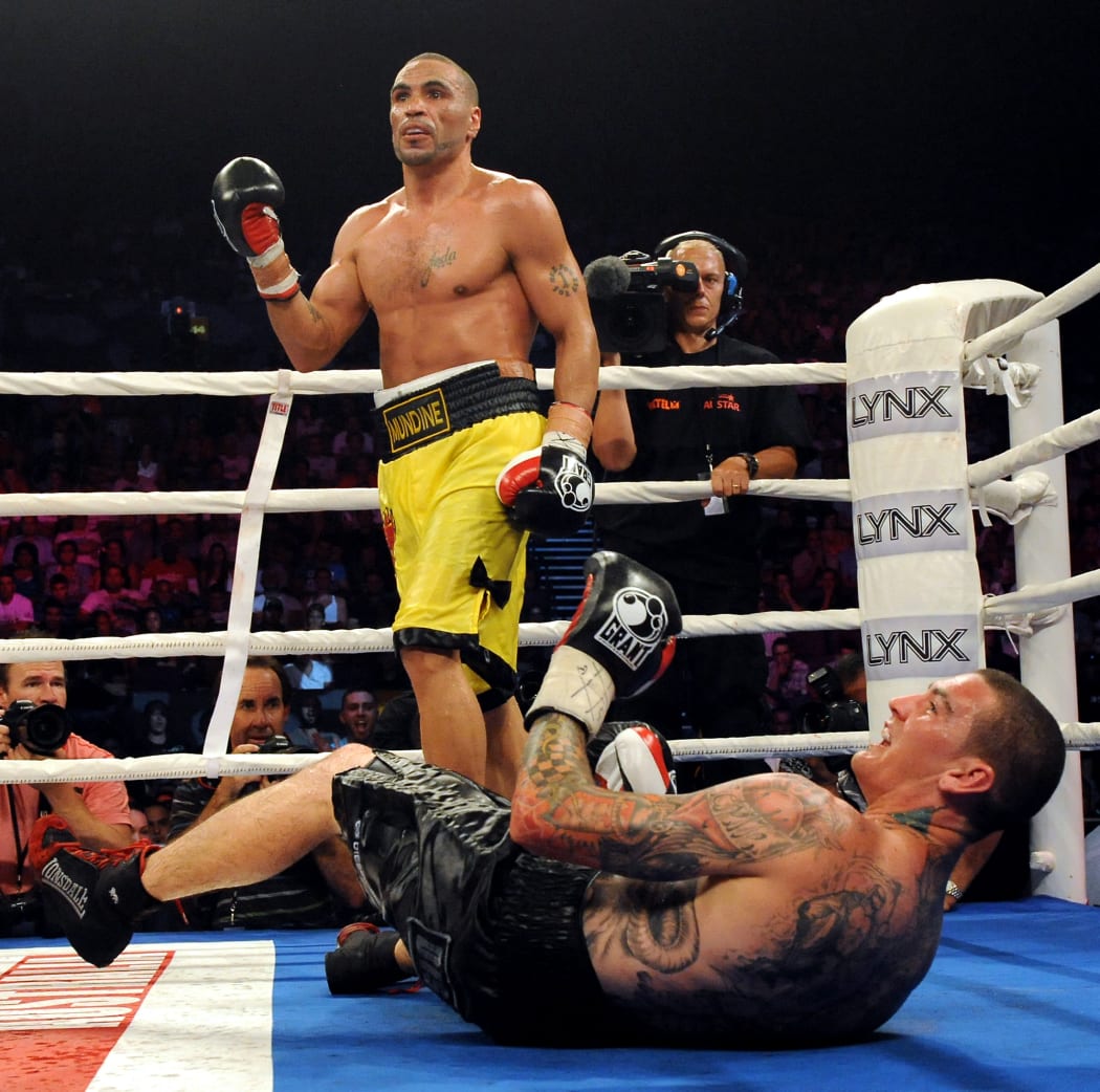 Anthony Mundine knocks down fellow Australian Rob Medley in a fight during his heyday. Mundine went on to win by unanimous points decision.