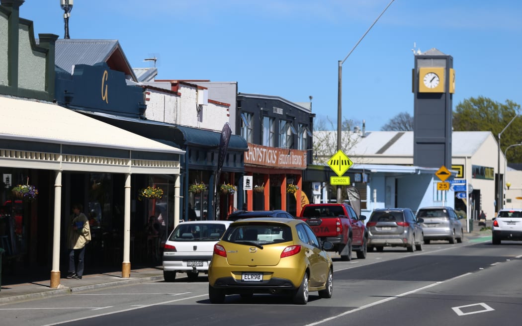 Carterton main street with cars and buildings