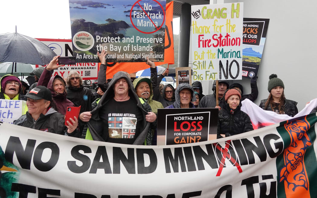 The protesters confront Resources Minister Shane Jones.