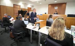 09052024. Robyn Edie. News. Southland Times/Stuff.  
Lawyers in the Invercargill Courthouse on Thursday for week 2 of the coronial inquest into Lachie Jones death, on 29th January 2019.
Lawyers from left, Susan Hughes KC, Robin Bates in back, Max Simpkins, standing is Simon Mount KC, Alysia Gordon and Beatrix Woodhouse. Coroner Alexander Ho in back.