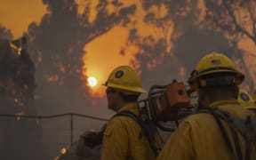 Firefighters battle the Alisal Fire near Goleta, California.