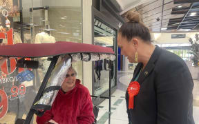 Carmel Sepuloni is greeted by a woman who said she had cast an early vote for the Labour Party already, at The Palms shopping centre in Christchurch.