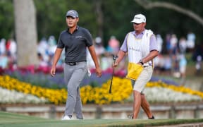 Danny Lee of New Zealand walks off the green on the 17th hole during THE PLAYERS Championship 2018.