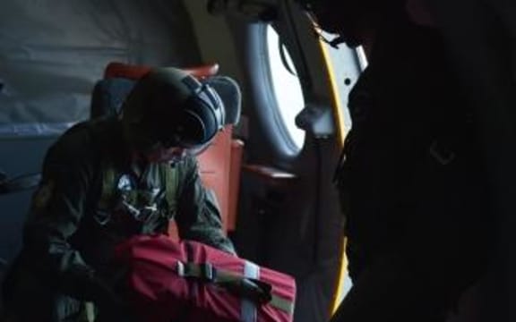 Aid dropped off to survivors found on missing Kiribati ferry.