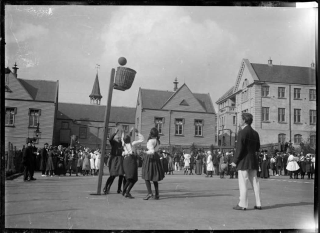 Netballers in about 1910 - playing with baskets.