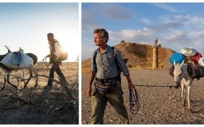 National Geographic Fellow Paul Salopek crosses the Kyzyl Kum desert of Uzbekistan en route to China during his decade-long Out of Eden Walk. And leads his mule past a royal tomb in east Turkey