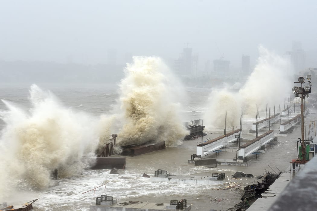 Waves crash onto the shore in Mumbai on May 17, 2021, as Cyclone Tauktae bore down on India.