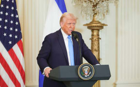 U.S. President Donald Trump speaks during a press conference with Israeli Prime Minister Benjamin Netanyahu in the East Room of the White House in Washington, D.C. on February 4, 2025. (Photo by Bryan Dozier / Middle East Images / Middle East Images via AFP)