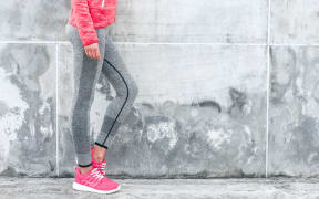 Girl wearing leggings, sports clothes.