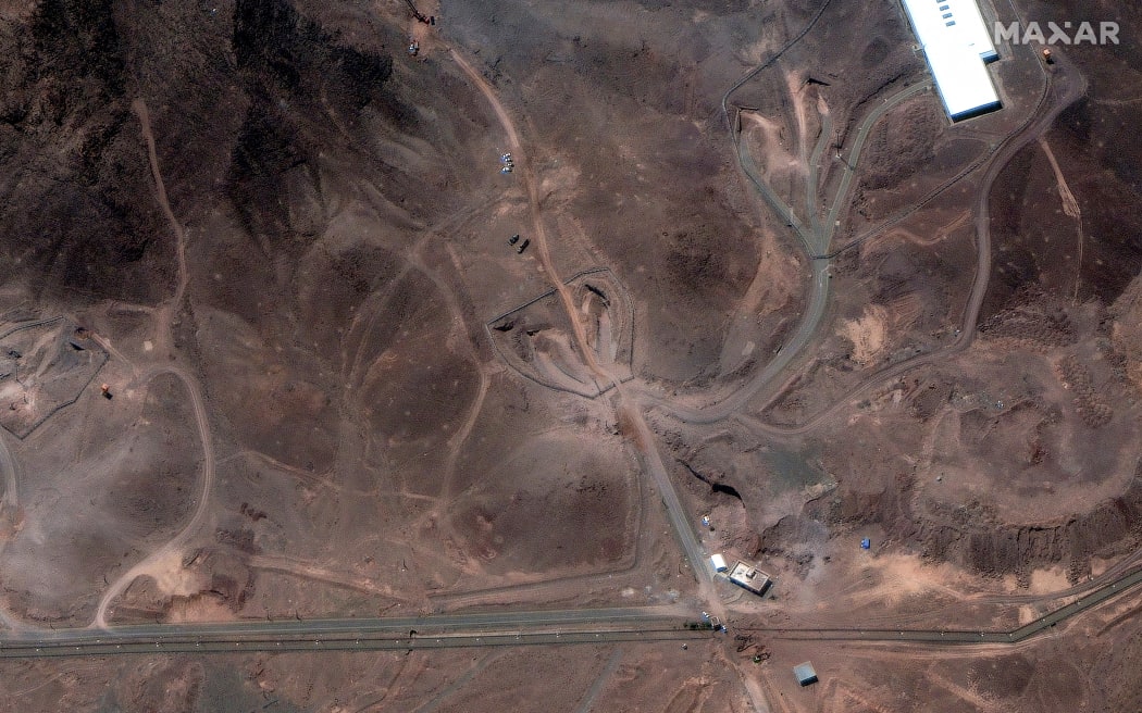 A satellite image provided by Maxar Technologies and dated 29 June 2025 shows a view of tunnel entrances at the Fordow Fuel Enrichment Plant complex.