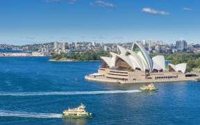 Aerial view of Sydney Opera House, and the harbour.