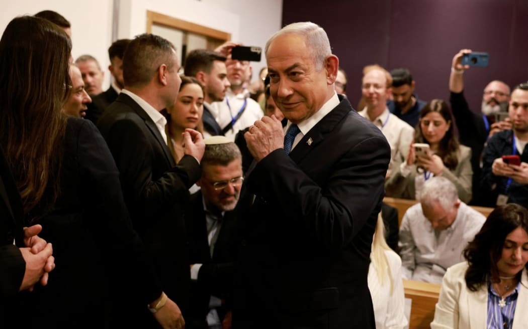 Israeli Prime Minister Benjamin Netanyahu arrives at the district court in Tel Aviv for his hearing on corruption charges on 10 December 2024.