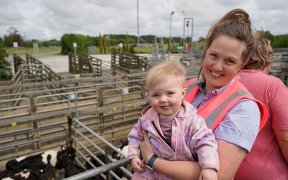 Kaye and her daughter check out the calves at the Temuka sale.
