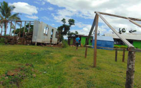 Homes being rebuilt in Nakorotubu district, Fiji, which scored a direct hit when Cyclone Winston tore through Fiji in February 2016.