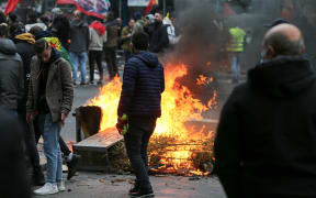 Clashes broke out between police and members of the Kurdish community during a demonstration at the Place de la Republique in Paris on December 24, 2022, a day after a gunman opened fire at a Kurdish cultural centre killing three people.