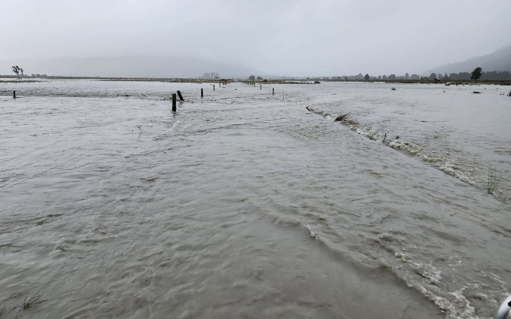 The latest deluge over Bernard Walkington's farm is about a metre higher than what occurred when the Wanganui River broke through, as seen here on 7 March.