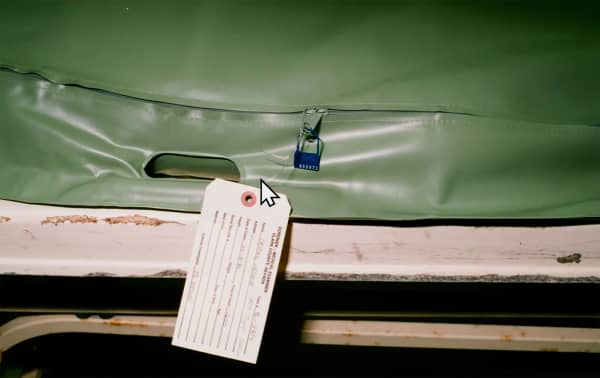 An image showing a body bag with the coroner/medical examiner's tag attached was shown during the trial on Tuesday, August 18. POOL/KVVU