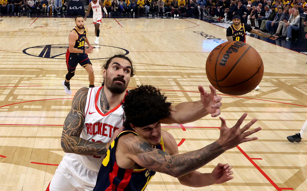 Steven Adams of the Houston Rockets rebounds against the Golden State Warriors during the NBA play-offs, 2025.