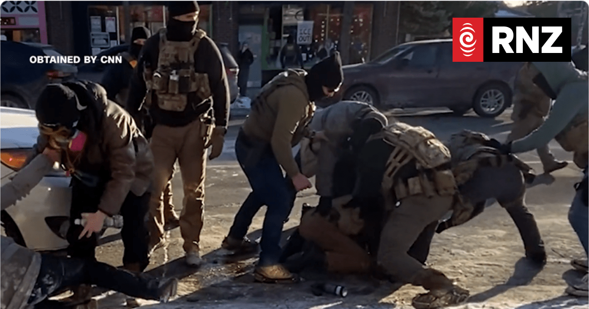 Videos appear to show US officer took gun away from Alex Pretti just before fatal shooting