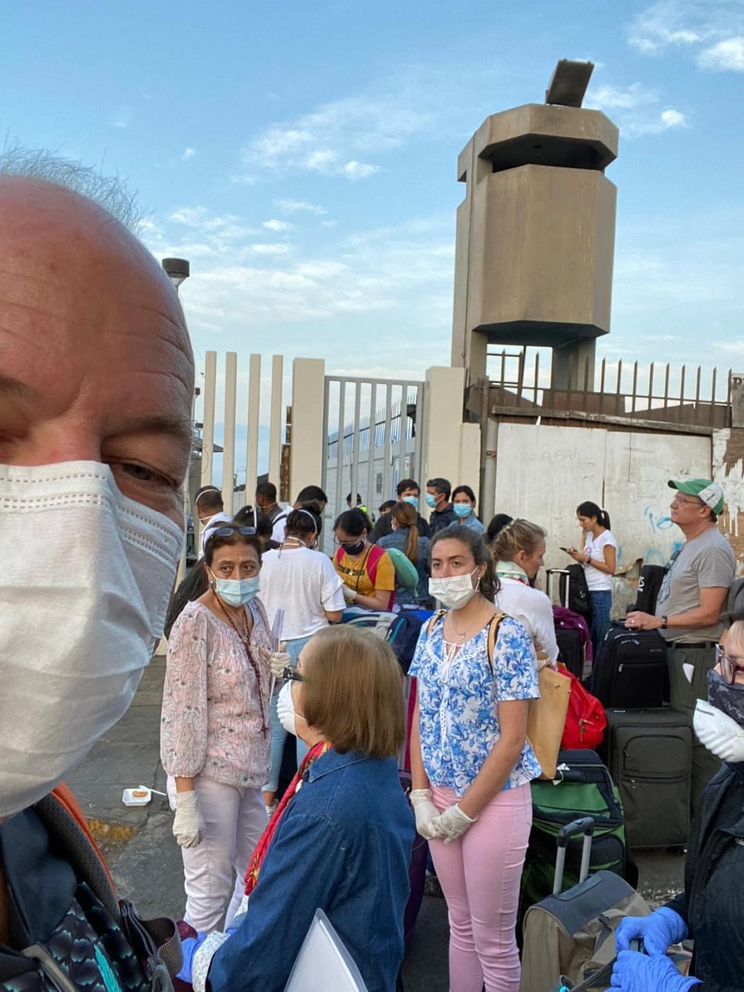 Ian Philips waiting to board a chartered flight in Peru