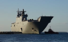Australian Navy HMAS Adelaide docked at Vuna Wharf in Tonga's capital Nuku'alofa on January 26, 2022.