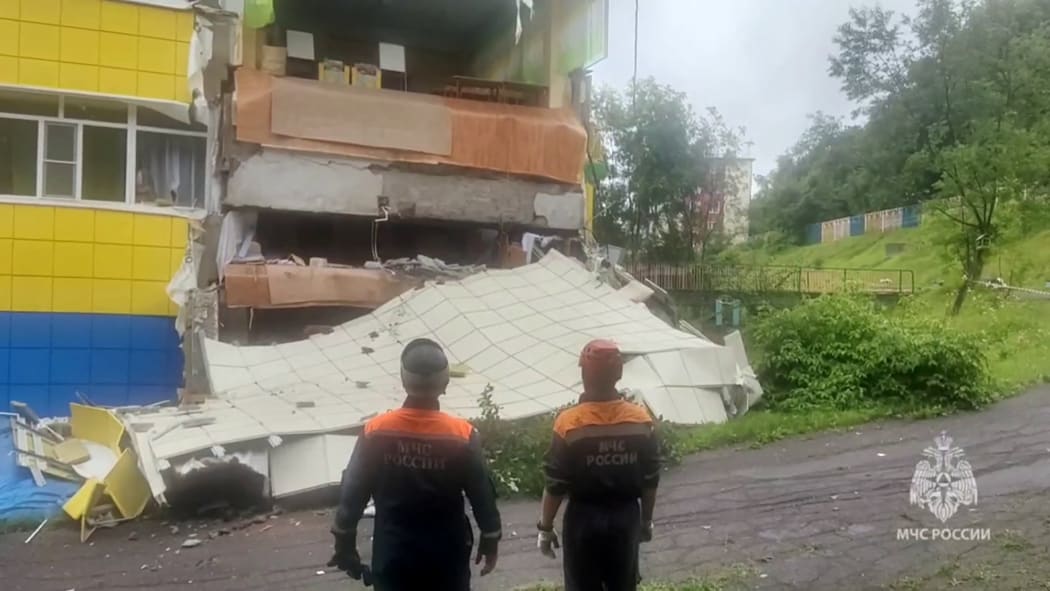 This video grab from a handout footage released by Russia's Emergencies Ministry on July 30, 2025, shows emergency service specialists inspecting a kindergarten damaged by an earthquake in Petropavlovsk-Kamchatskyi. (Photo by Handout / Russian Emergencies Ministry / AFP) / RESTRICTED TO EDITORIAL USE - MANDATORY CREDIT "AFP PHOTO / RUSSIA'S EMERGENCIES MINISTRY" - HANDOUT - NO MARKETING NO ADVERTISING CAMPAIGNS - DISTRIBUTED AS A SERVICE TO CLIENTS
