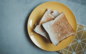 Slices of freshly toasted bread.