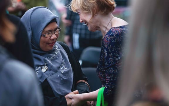 Yvonne Dasler supports a member of the local Muslim community.