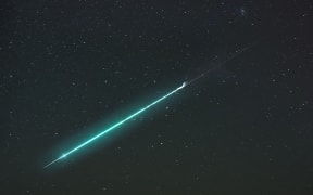 The meteor streaking across the sky was photographed by Jono Matla in Waikanae.