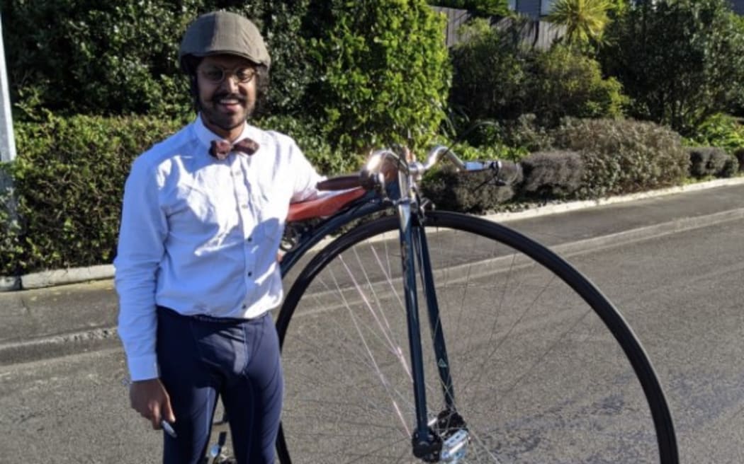 Dr Nikhil Sarma with his electric penny-farthing