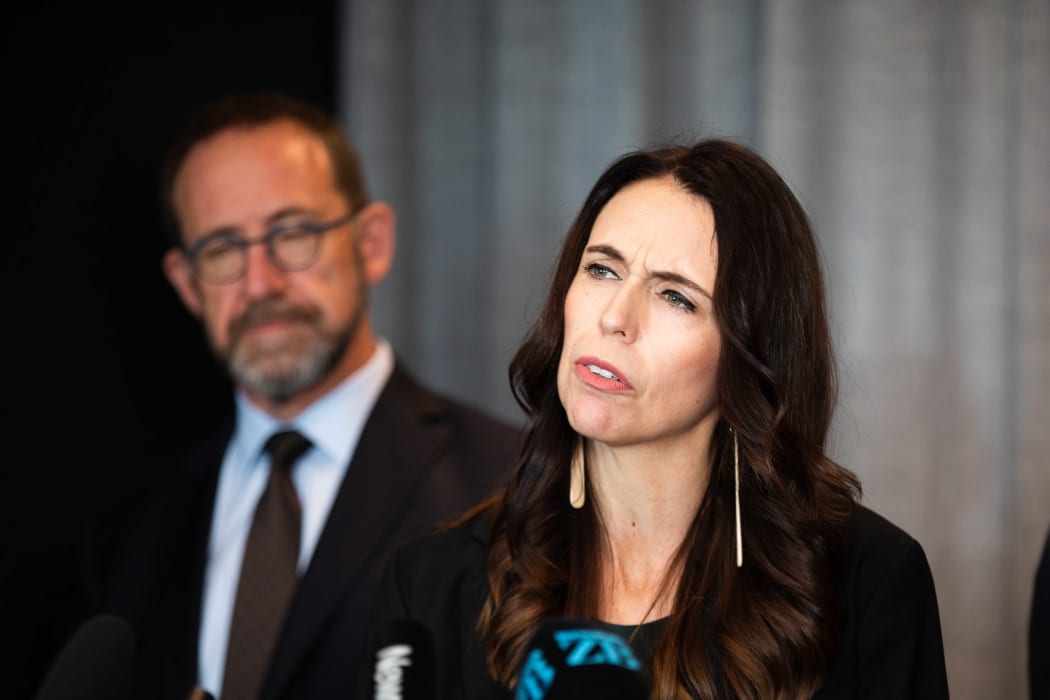 Prime Minister Jacinda Ardern, with Health Minister Andrew Little, left, announces the first batch of Pfizer-BioNTech vaccines is due to arrive next week.