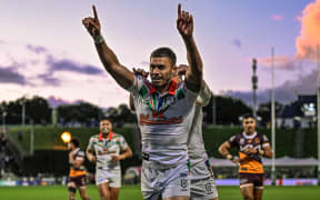 Chanel Harris-Tavita of the Warriors celebrates his try.
One NZ Warriors v Brisbane Broncos Heritage Round 17 of the Telstra NRL Premiership at Go Media Stadium, Mt Smart, Auckland, New Zealand on Saturday 29 June 2024. © Photo: Andrew Cornaga / Photosport