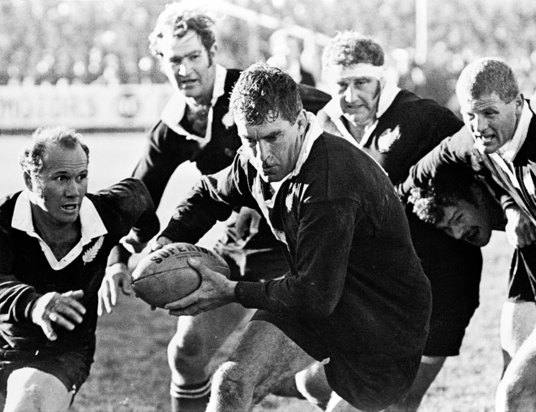 All Black Captain Colin Meads breaks from ruck supported by halfback Sid Going in an All Blacks vs British and Irish Lions in Dunedin on 26 June, 1971.