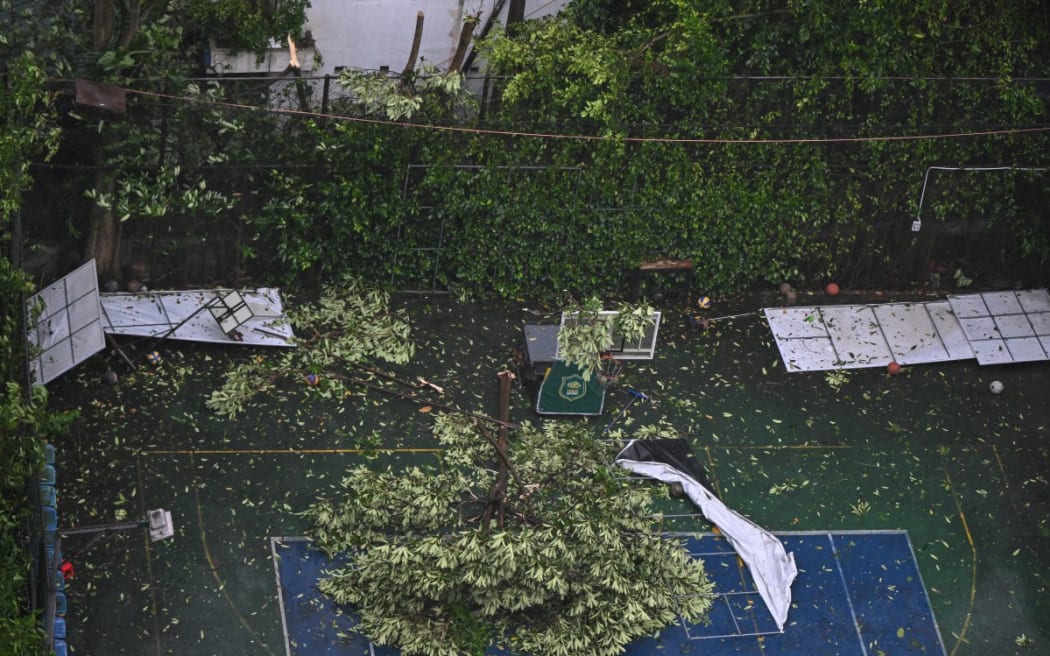 Broken tree branches as heavy rain and strong winds in Vinh city, Nghe An province, on 25 August, 2025, after Typhoon Kajiki made landfall.