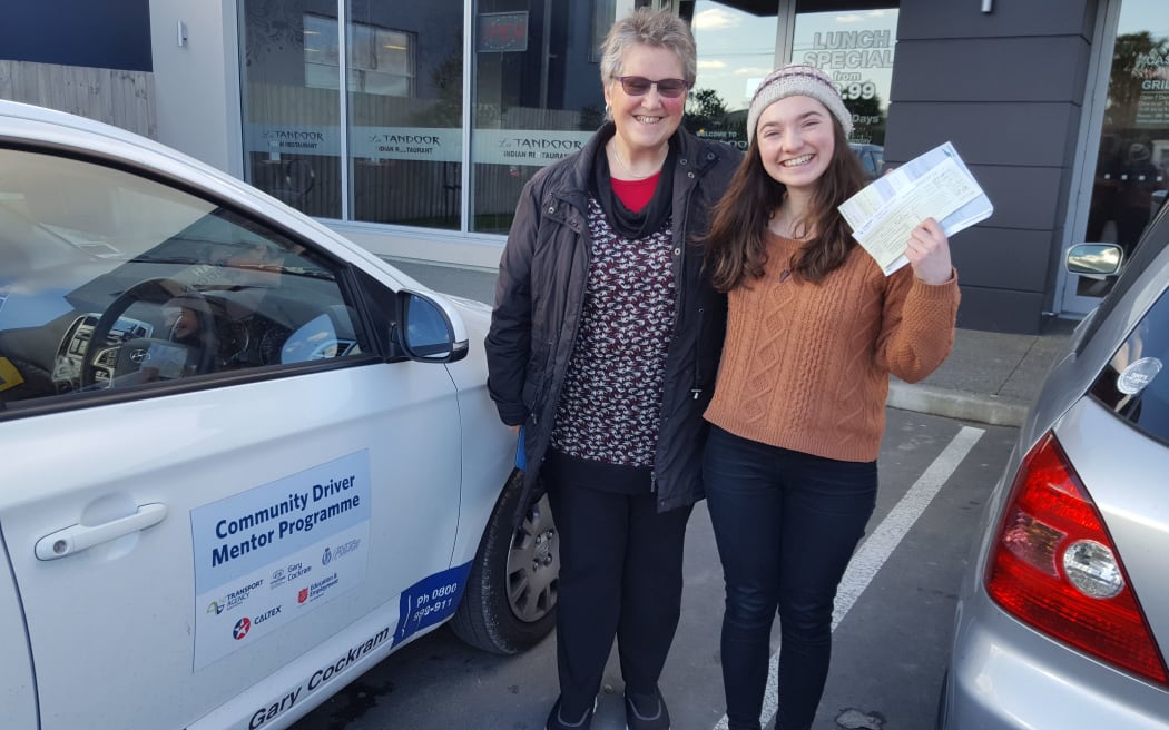 Tutor Jen Little (left) with Rachel Hills who successfully passed her restricted driver licence test.
