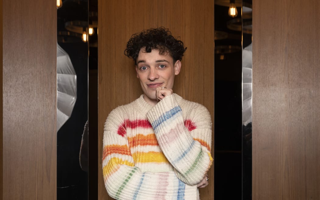 Switzerland's contestant Nemo reacts during the press meeting ahead of the concert at the Nordic Eurovision Party, in Stockholm on April 14, 2024. (Photo by Fredrik SANDBERG / TT News Agency / AFP) / Sweden OUT
