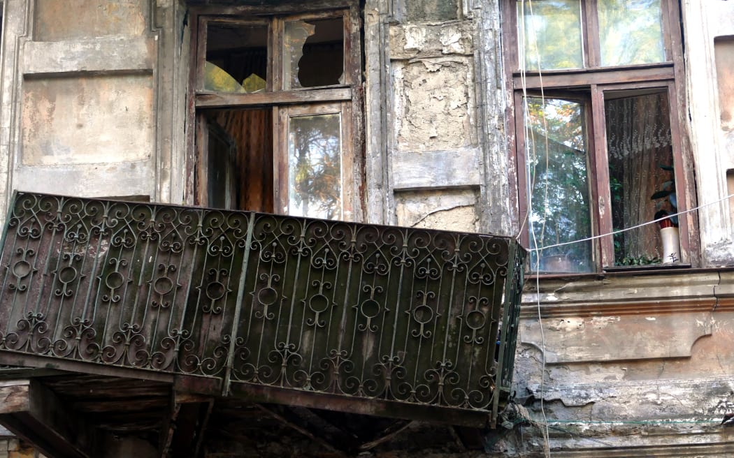 Windows of a residential building in Bazarna Street where a wall has collapsed, Odesa, southern Ukraine on 30 August, 2023.