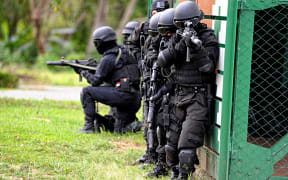 This photo taken on April 1, 2017 shows an Indonesian anti-terror police unit during a training exercise in Banda Aceh.